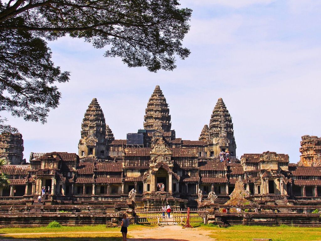 Angkor Wat temple main entrance under a clear blue sky in Siem Reap, Cambodia.